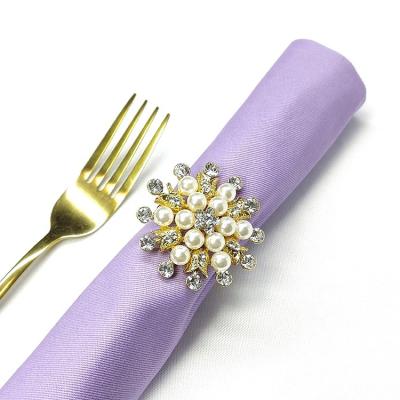 China Viable Wholesale Luxury Diamond Rose Flower Gold Pearl Rhinestone Crystal Napkin Rings Napkin Ring Stand For Wedding Table Decoration for sale