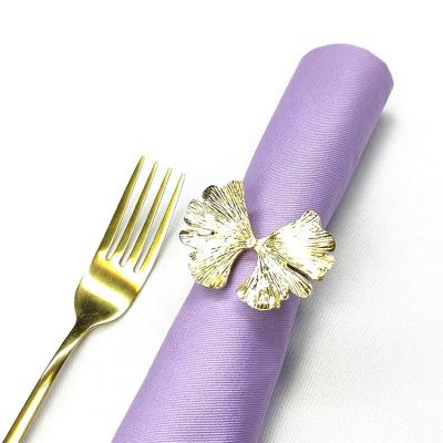 China Amazon Sustainable Hit Metal Gold Ginkgo Leaf Butterfly Handmade Napkin Rings For Wedding Decoration for sale