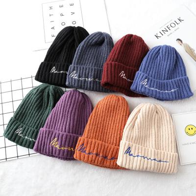 China COMMON Christmas custom cotton logo thick winter hats for women and men's embroidery logo knitted beanie hats for sale