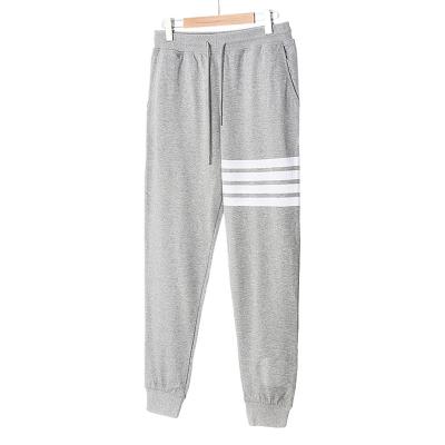 China Hot Selling Anti-wrinkle Loose Men's Breathable Sports Casual Pants Cotton Stripped Track Pants for sale