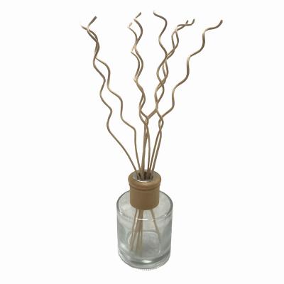 China Hot Selling Amazon Sustainable Different Curly Shape Aroma Wooden Diffuser Sticks for sale