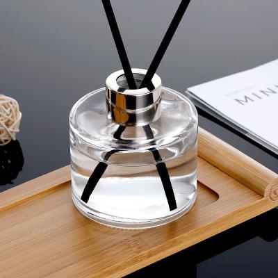 China Household Products Custom Color Round 100Ml Aromatherapy Bottle Reed Diffuser Glass Bottle With Cap for sale