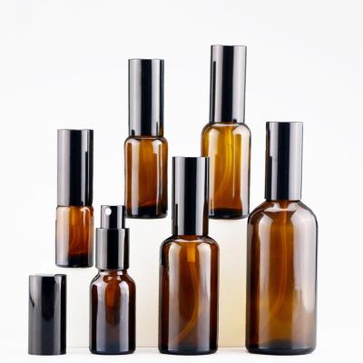 China Personal Care 100Ml Amber Empty Glass Essential Oil Bottle Cosmetics Mist Spray Bottle Perfume Bottle for sale