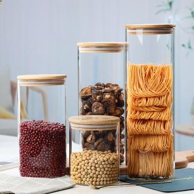 China Feature Eco-friendly Heatable Round 500Ml Borosilicate Glass Storage Jar With Bamboo Lid for sale