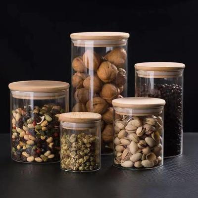 China Heatable Glass Food Storage Jars Containers With Lids Airtight Bamboo Kitchen Glass Canisters For Coffee Set for sale