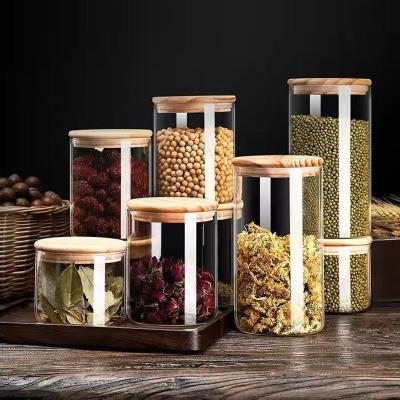 China 500Ml 1000Ml Heatable Round Airtight Glass Food Storage Jars Containers With Bamboo Lid for sale