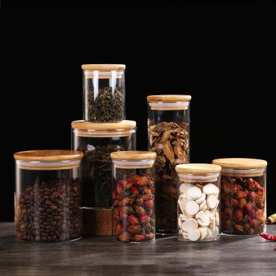 China 500Ml 1000Ml Candy Jar Potato Storage Heatable Transparent Sealed Glass Jar Wholesale With Bamboo Lid for sale