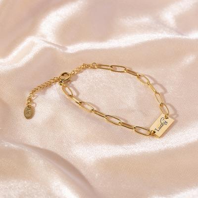 China FASHIONABLE Titanium Steel Rectangular 18k Gold Plated Lucky Letter Engraving Wide Chain Bracelet Women for sale