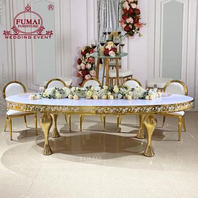 China New Luxury Oval Shape Mermaid Table Leg MDF Gold Wedding Table For Dining for sale