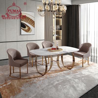 China Modern dining room furniture brushed top dining table and base brass marble chair for sale