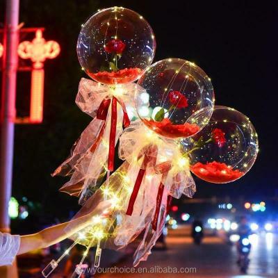 China PVC Carry Kaile Valentine's Day Gifts Transparent Luminous Bubble Balloon LED Rose Bouquet For Wedding Valentines Day Gifts for sale