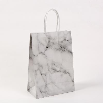 China Recyclable 2022 new wholesale clothing shopping kraft paper marble gift bag for sale