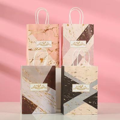 China Recyclable custom made high quality kraft paper birthday valentine's day gift bag clothing shopping bags for sale