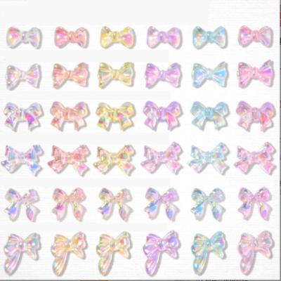 China 3D DIY Resin Butterfly 50pc/pack Glass Plastic Charms Acrylic Bow Rose Nail Art Jewelry Decorations for sale