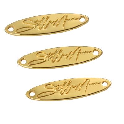 Cina Viable Custom Engraved Gold Color Garment Label Hardware Custom Accessories Bags Brand Metal Tags in vendita