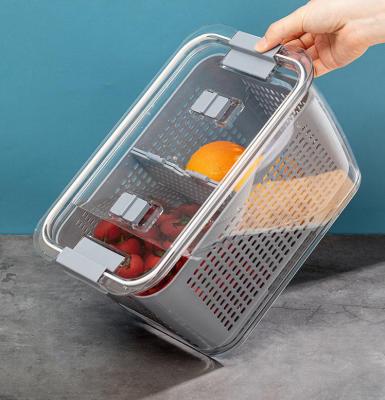 China Transparent Freshness Preservation Refrigerator Organizer Bins Refrigerator Storage Bins Storage Box With Drain Basket for sale