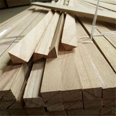 China Modern solid wood paulownia batten strip building chamfer strip wood timber for sale