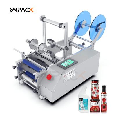 China YM130 Manual Round Bottle Labeling Machine Semi-auto Label Applicator For Round Bottle zu verkaufen