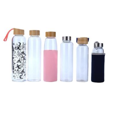 China Sustainable SARTLII Custom Logo 500ml 700ml 1000ml Unique Glass Water Bottle With Silicone Sleeve for sale