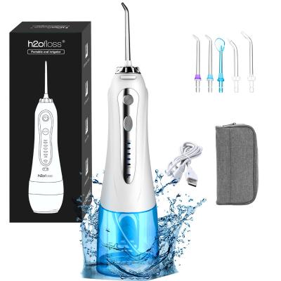 China Waterproof Dental Electric Tooth Cleaner Jet Flosser Oral Irrigator Ultrasonic Soft Waterproof Tank 300ml IPX7 Water Battery IPX7 for sale