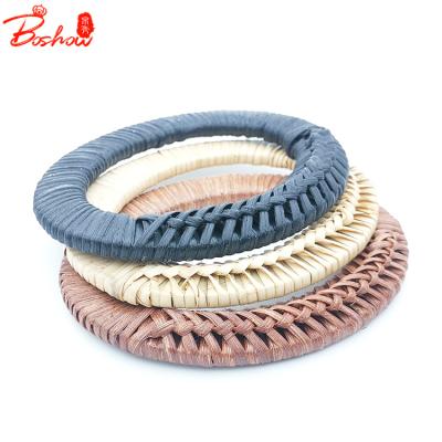 China 2021 Fashion Style Purse Tote Rattan Braided Handles 15cm*12.1cm Oval Shape Straw Weaved Becket Natural Manufactory BS070314 for sale