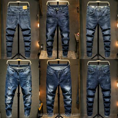 China Large Size Casual Men's Jeans Personality Breathable Holes Slim Small Foot Jeans Handsome Soft Pants for sale