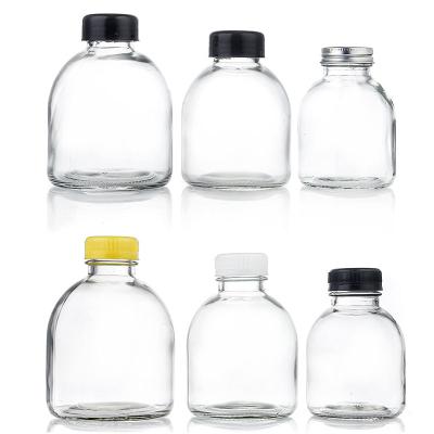 China Wholesale Custom High Quality Clear Round Empty 250ml, 350ml, 500ml Drinking Glass Water Bottle With Lid for sale