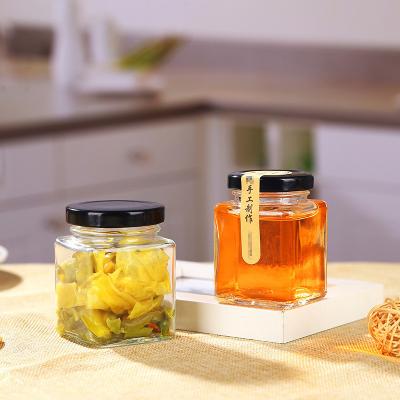 China 100ml food transparent glass food jar /candy glass ajr,storage jar with glass lid for sale