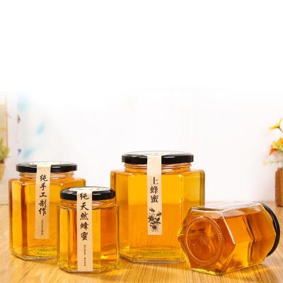 China Wholesale 45ml Hexagon Glass Honey Bottle Glass Jam Food Storage Jar for sale