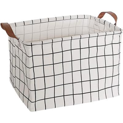 China Viable Foldable Rectangular Waterproof Liner With Handle White Household Storage Toy Storage Rack Basket Lattice Storage Basket for sale