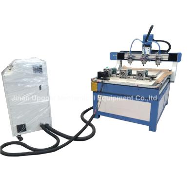 China 3 Heads 3 Rotary Axis Wood Metal Stone CNC Engraving Cutting Machine for sale