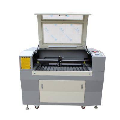 China Leather Cutter Machine Co2 Laser Cutter 90W with 900*600mm Working Area for sale