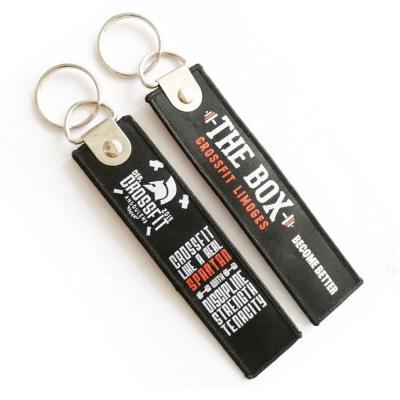 China Motorbike Main FOB Loot Cloth Car Bike Promotion Motorcycle Black Leather Luggage Woven Key Chain Remove Theft Embroidery Key Indicator for sale