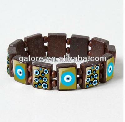 China Natural Wooden Bead Fashion Dragon Evil Eye Bracelet Turquoise Color for sale