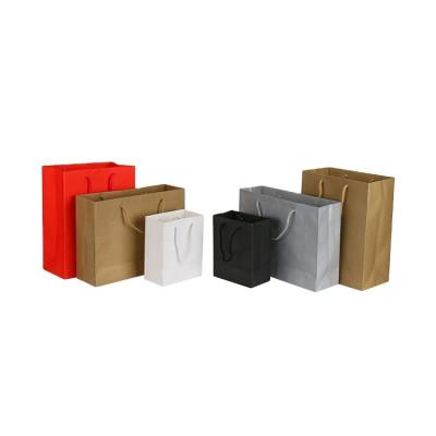 China Wholesale Recyclable Custom Colored Recycled Brown Silver White Black Red Paper Handle Kraft Gift Shopping Bag for sale