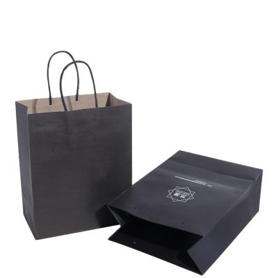 China Recyclable Luxury Christmas Raw Materials Making Paper Carrier Gift Bags With Twisted Handle for sale