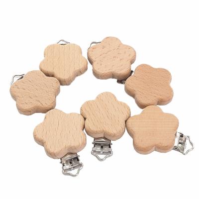 China BPA Free Beech Wood Flower Shape Dummy Clip Baby Teething Pacifier Chain DIY Holder Hot Wooden Pacifier Clip for sale