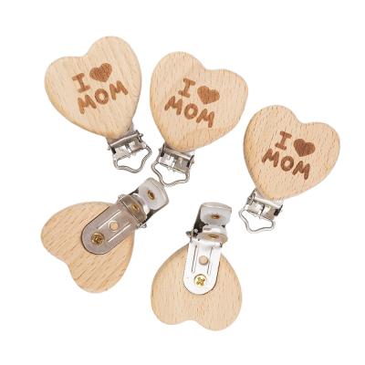 China Best Price BPA Free Beech Wooden Clips Metal Frame DIY Baby Teething Pacifier Chain Personalized Baby Pacifier Clip for sale