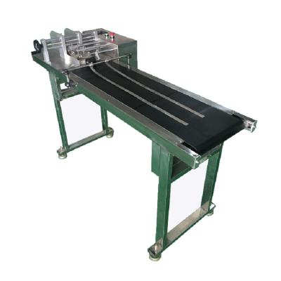 China Automatic Food Bag Friction Feeder 5-50m/min Paging Machine Carton Friction Feeder Machine for sale