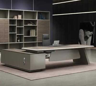 China Mesa de alta gama de la CEO Muebles de oficina modernos de lujo Oficina ejecutiva Escritorio Mesa de oficina con mesa lateral y cajón en venta