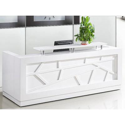 China Venta al por mayor Salón de belleza de diseño de lujo Madera Blanco Muebles de oficina modernos mostrador Mesa de recepción en forma de L en venta