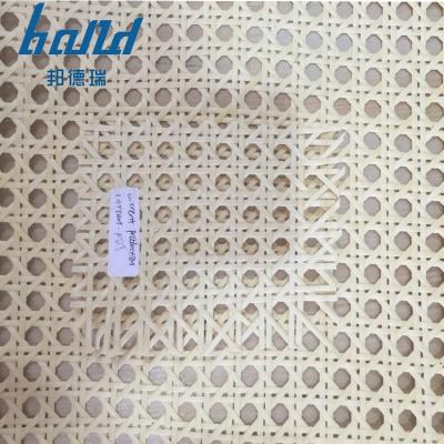 China Europe Mesh PE Rattan Cane Webbing Raw Material Open Woven Rattan Roll Offer For Rattan Furniture Manufacturer for sale