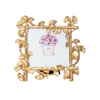 China European American Retro Alloy Style Photo Frame Light Luxury Golden Ginkgo Leaf Wedding Photo Frame for sale