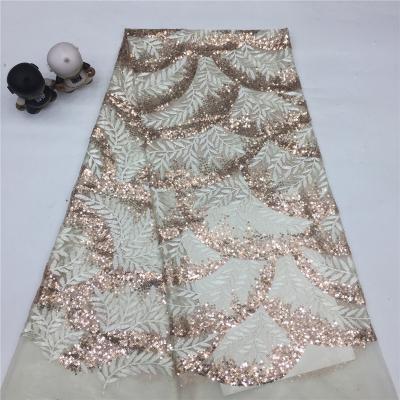 China Fashion Sustainable Gold Glitter Net Sequin Shiny Embroidered Fabric for sale