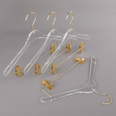 China Modern luxury coatCustom acrylic hangers with logo clothes edges hanger clips for sale