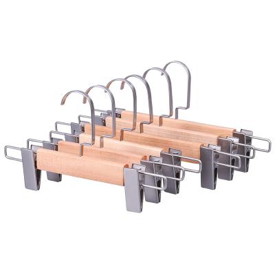 China Durable Wholesale High Quality Natural Clothes Pants Hanger With Metal Clip Clamp for sale