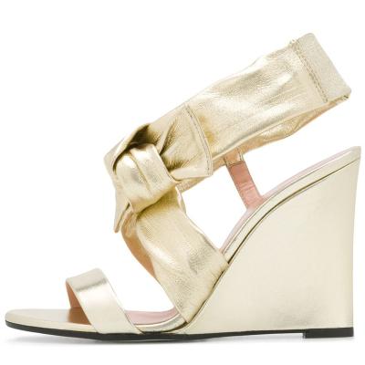 China Wholesale Fashion Trend Sneakers Arch Ankle Strap Sandals Metallic Wedge Heels For Ladies Summer Casual Wedge Sandals For Women for sale