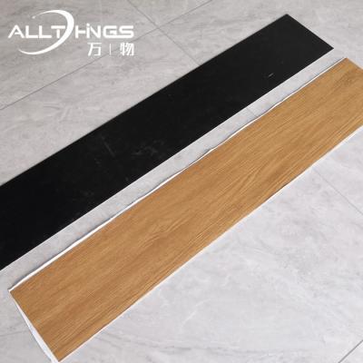 China Indoor High Quality Anti-water Hot Sale Tile Waterproof Interlocking PVC Flooring Self Adhesive Luxury Vinyl Plank for sale