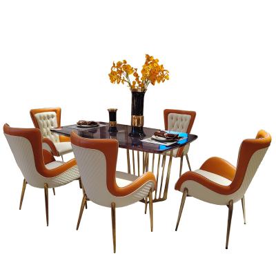 China Luxury Nordic Style Modern Style Dining Table And Chairs Marble Sets For 6 /8 Person Stainless Steel Base for sale