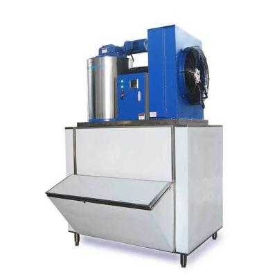 China Water Cooling Condensation Way 1000kg Flake Ice Making Machine with Ice Storage Bin Te koop